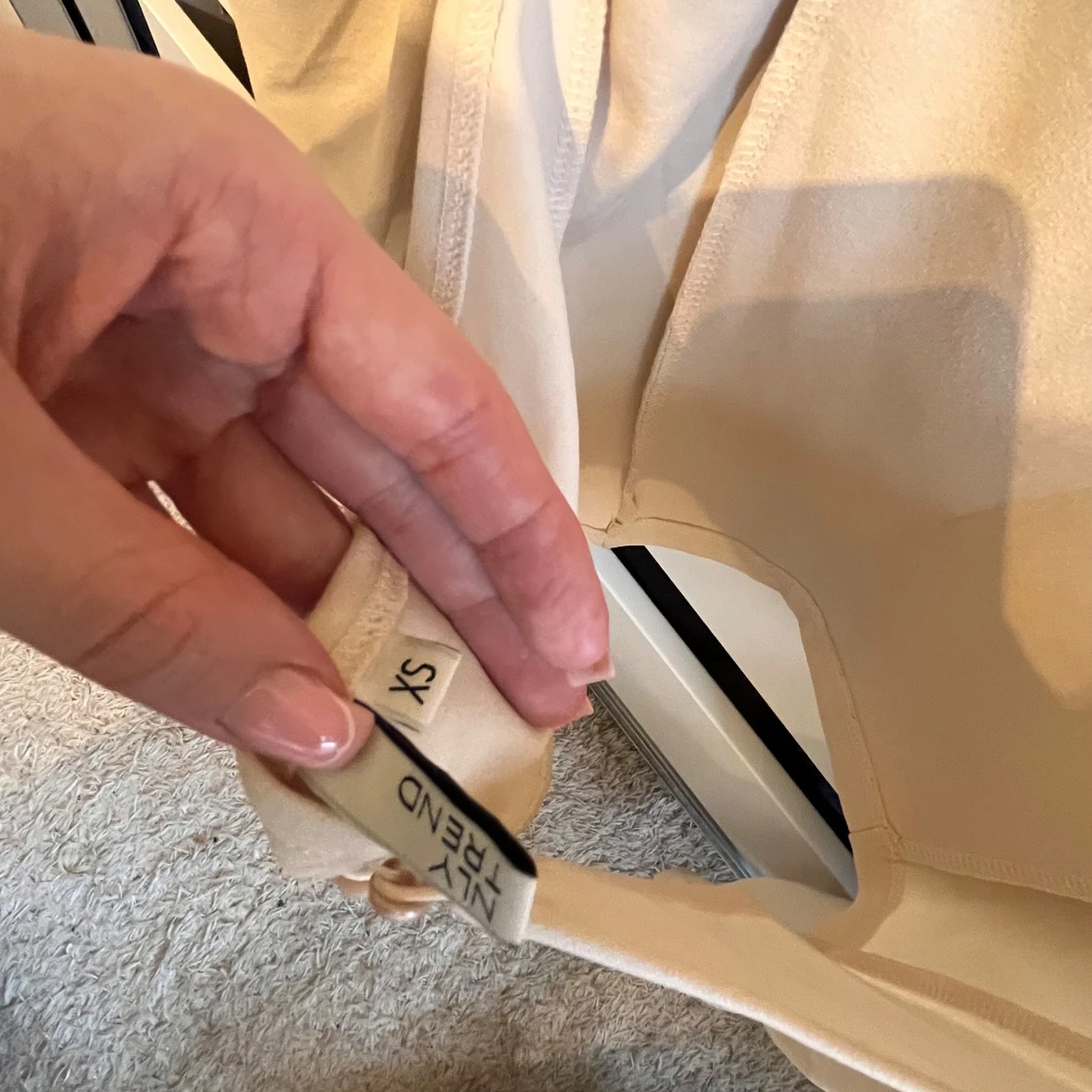 Beige topp med långa ärmar från New Trend