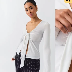 Tie front sleeve top - Snygg top ifrån ginatricot som köptes i slutet av förra sommaren, aldrig använt den så inga defekter 
