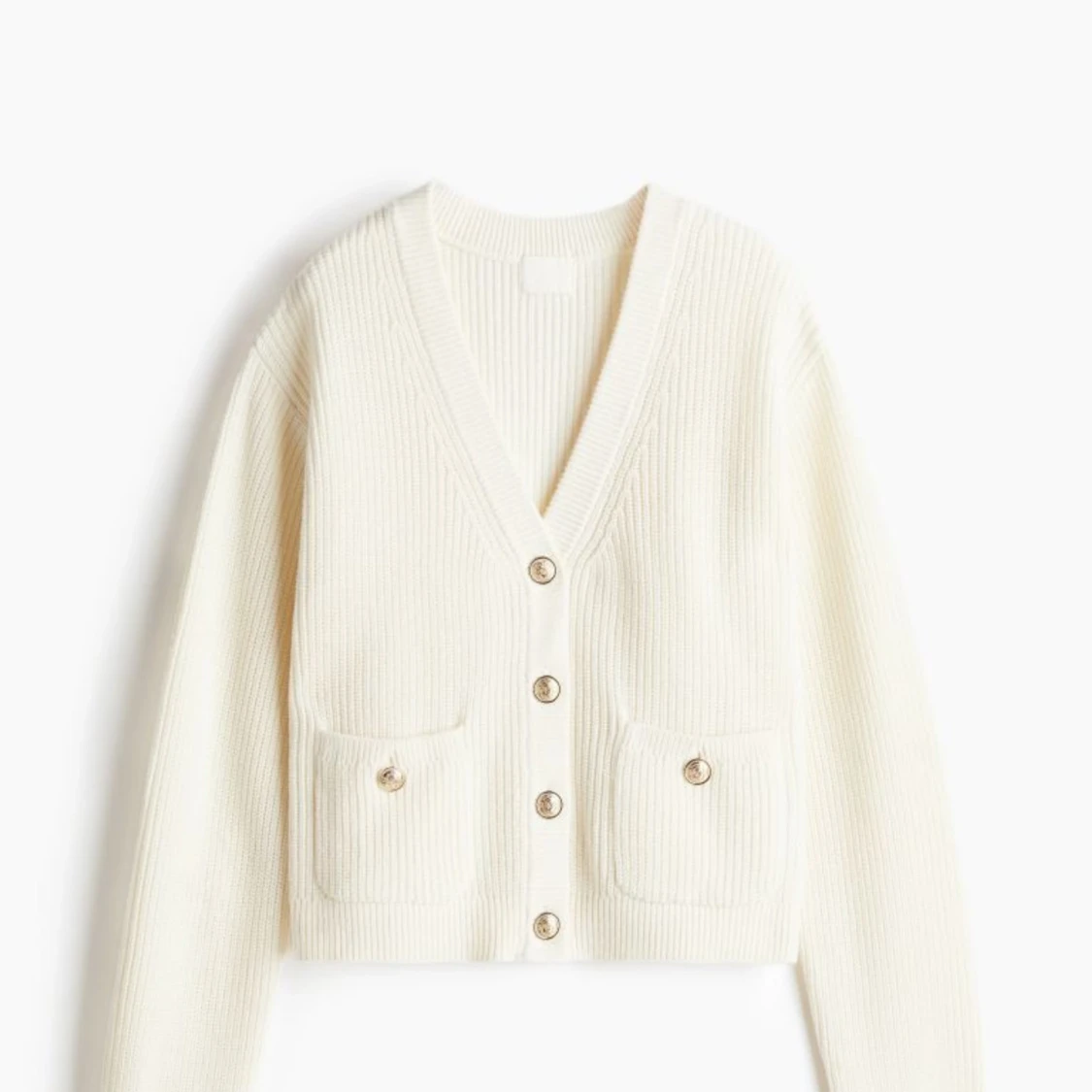 Vit ribbad kofta med knappar