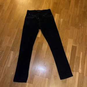 Nudie grim tim jeans svarta - Nudie grim tim jeans storlek w31L32. Knappast använda.