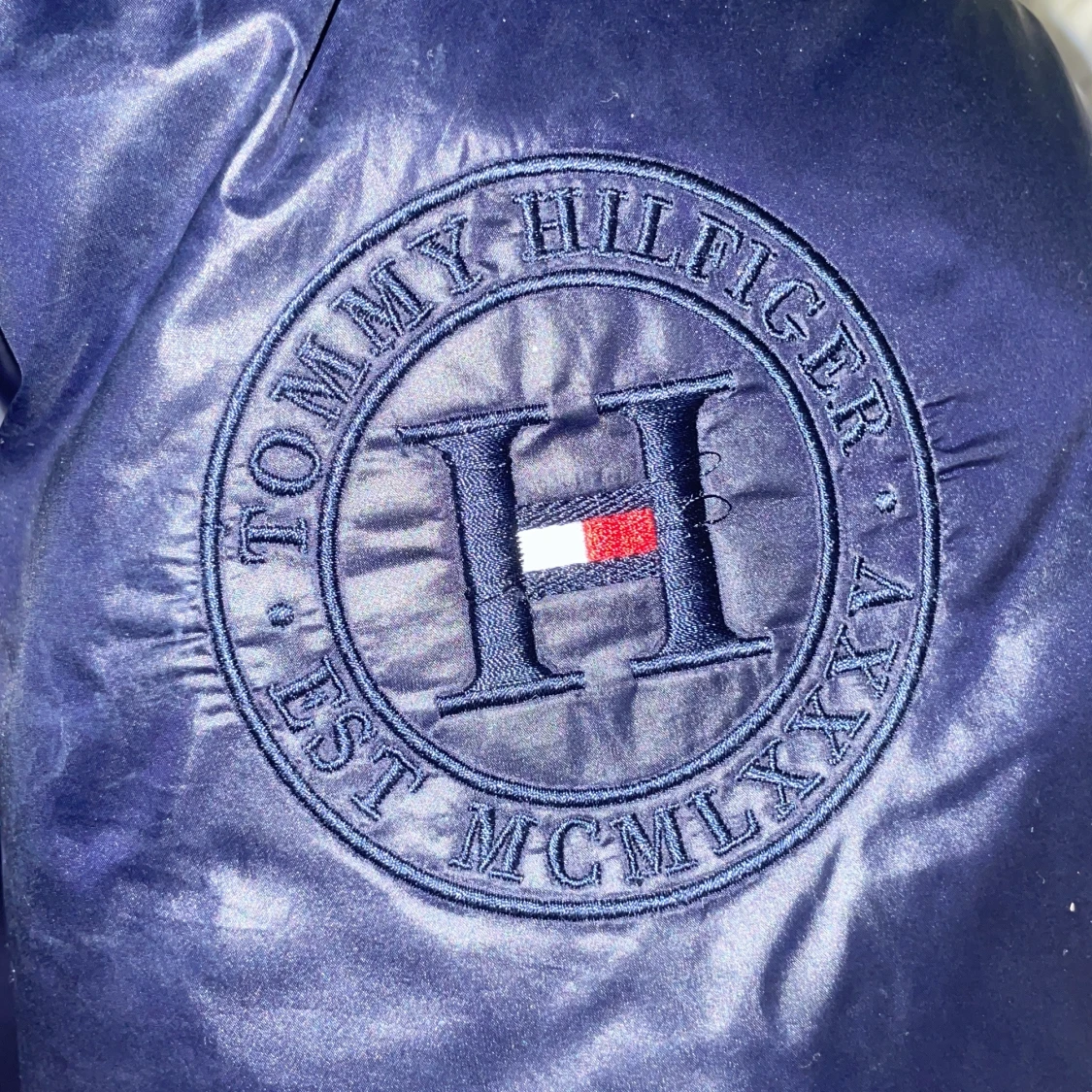 Marinblå dunjacka från Tommy Hilfiger - 92