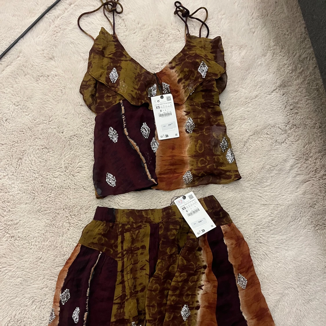 Mönstrat sett med paljetter