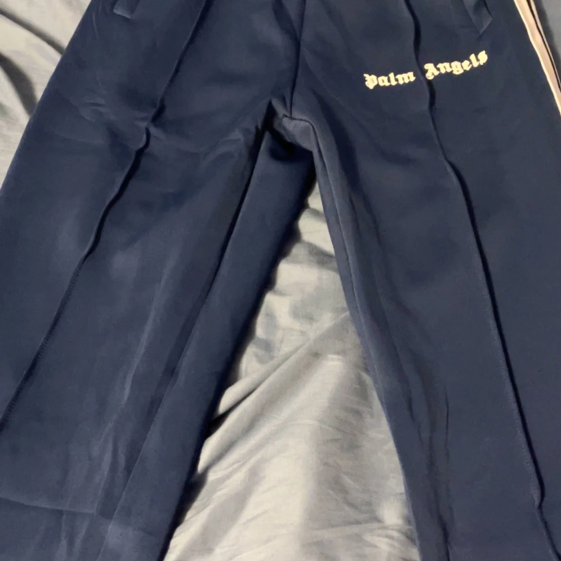 Mörkblå byxor från Palm Angels