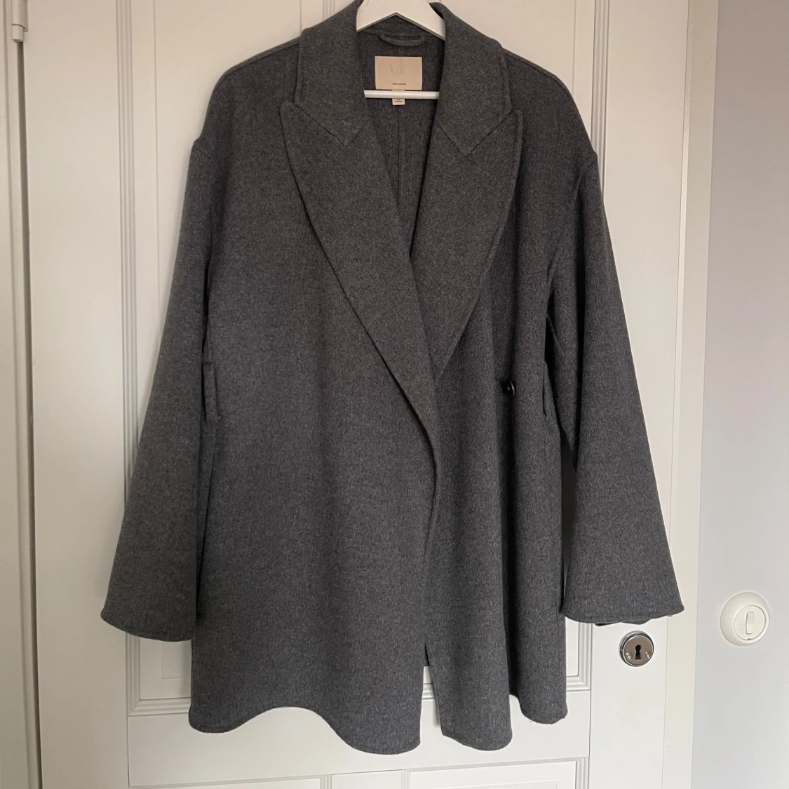Grå ullblandad kappa från H&M