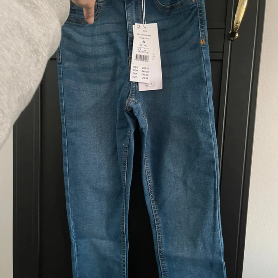 Blå högmidjade jeans