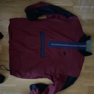ACG Nike windbreaker  - It is in okey condition but has a slight rip on the wrist. Says medium but fits a little bigger. Very thin material 