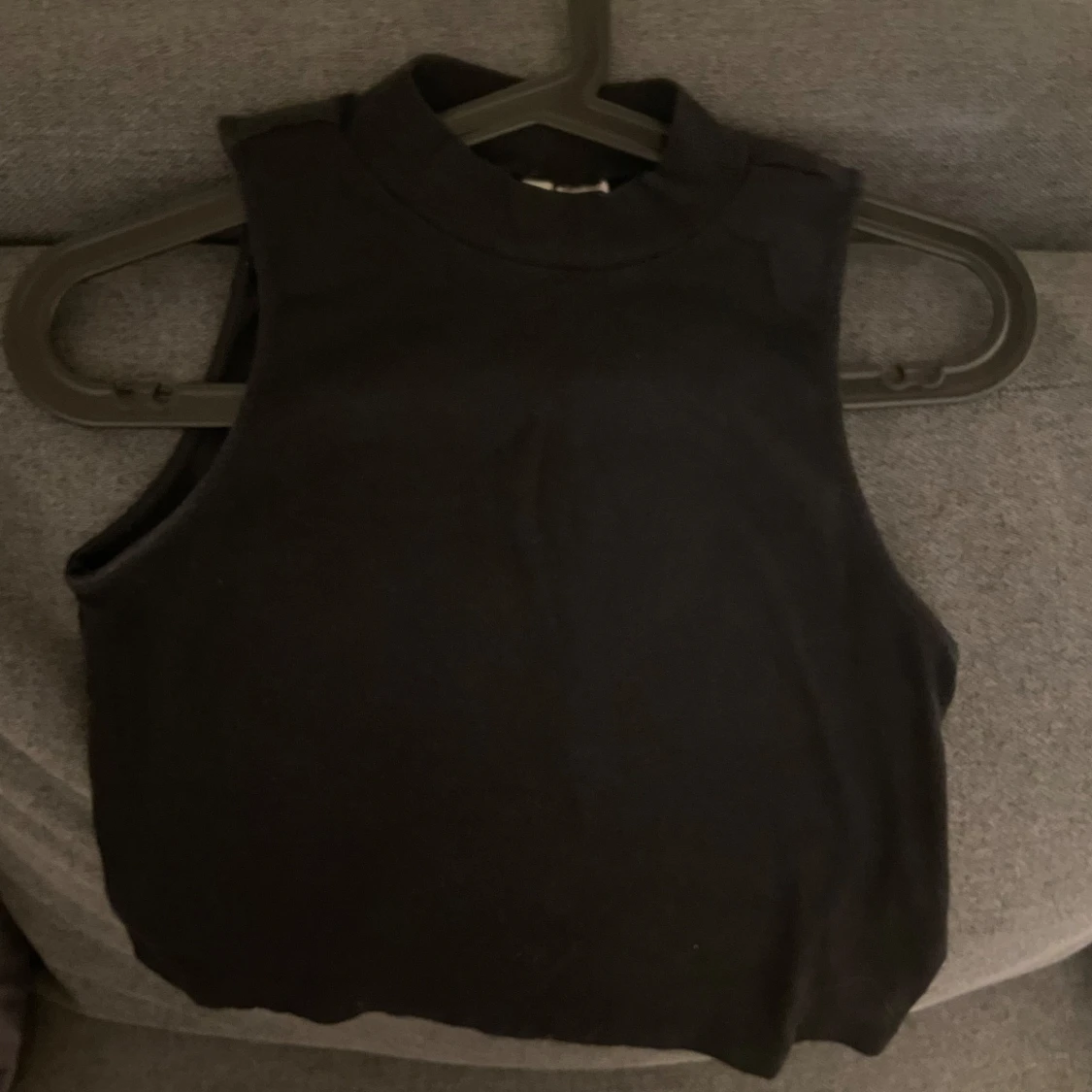 Svart topp för kvinna