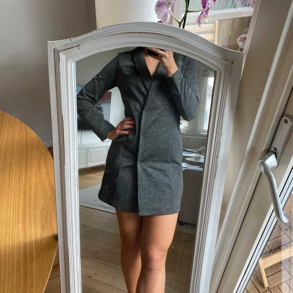 Glittrig kostymklänning