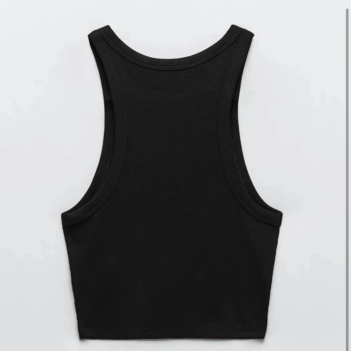 Svart linne i storlek xs