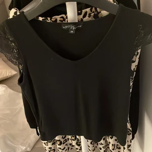 En svar fin tröja  - En svart fin tröja som är helt oanvänd 