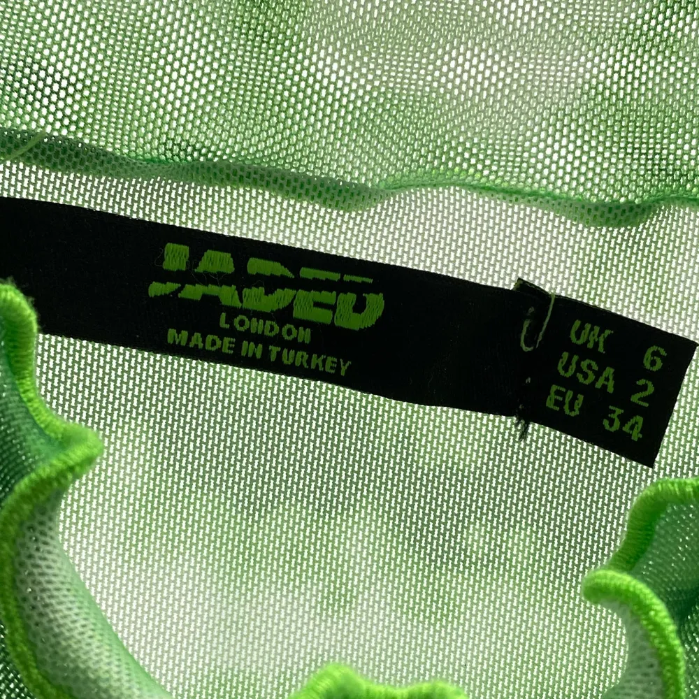 Lime green body i mesh från Jaded London, bara använd en gång☺️ Nypris ca 400kr✨✨. Toppar.