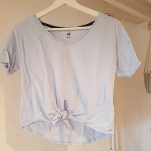 H&M workout top - Blue, front tie workout top from H&M. Worn it once or twice.