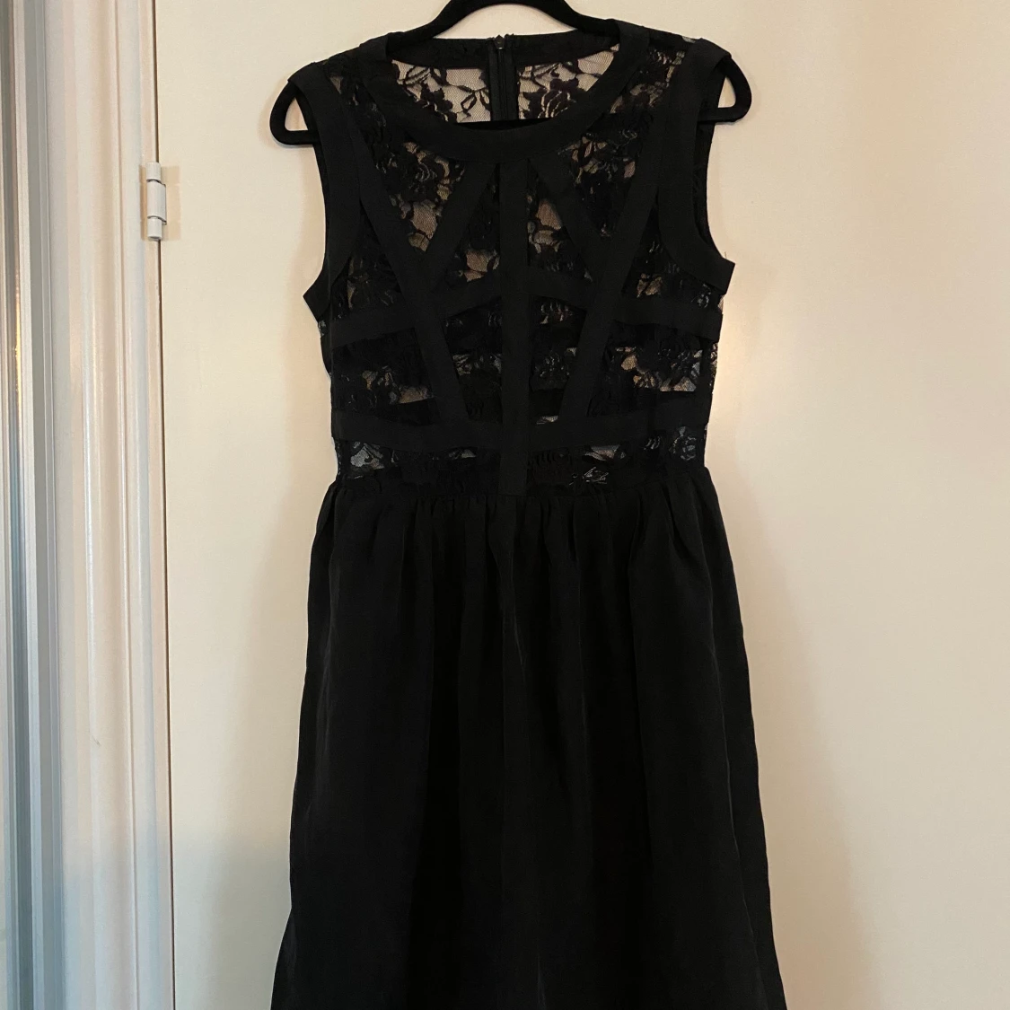 Svart klänning i storlek small