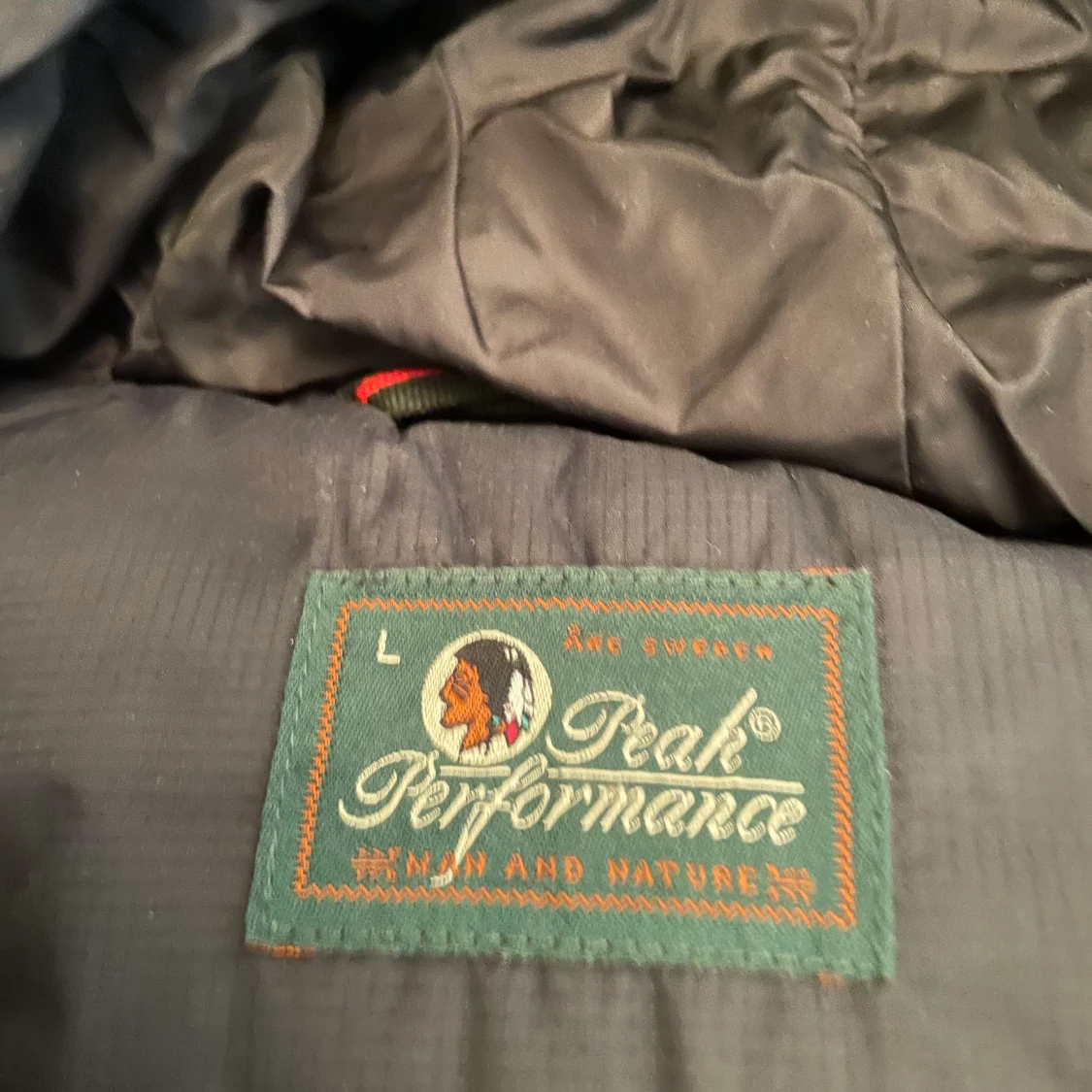 Svart Dun jacka från peak performance  - 90