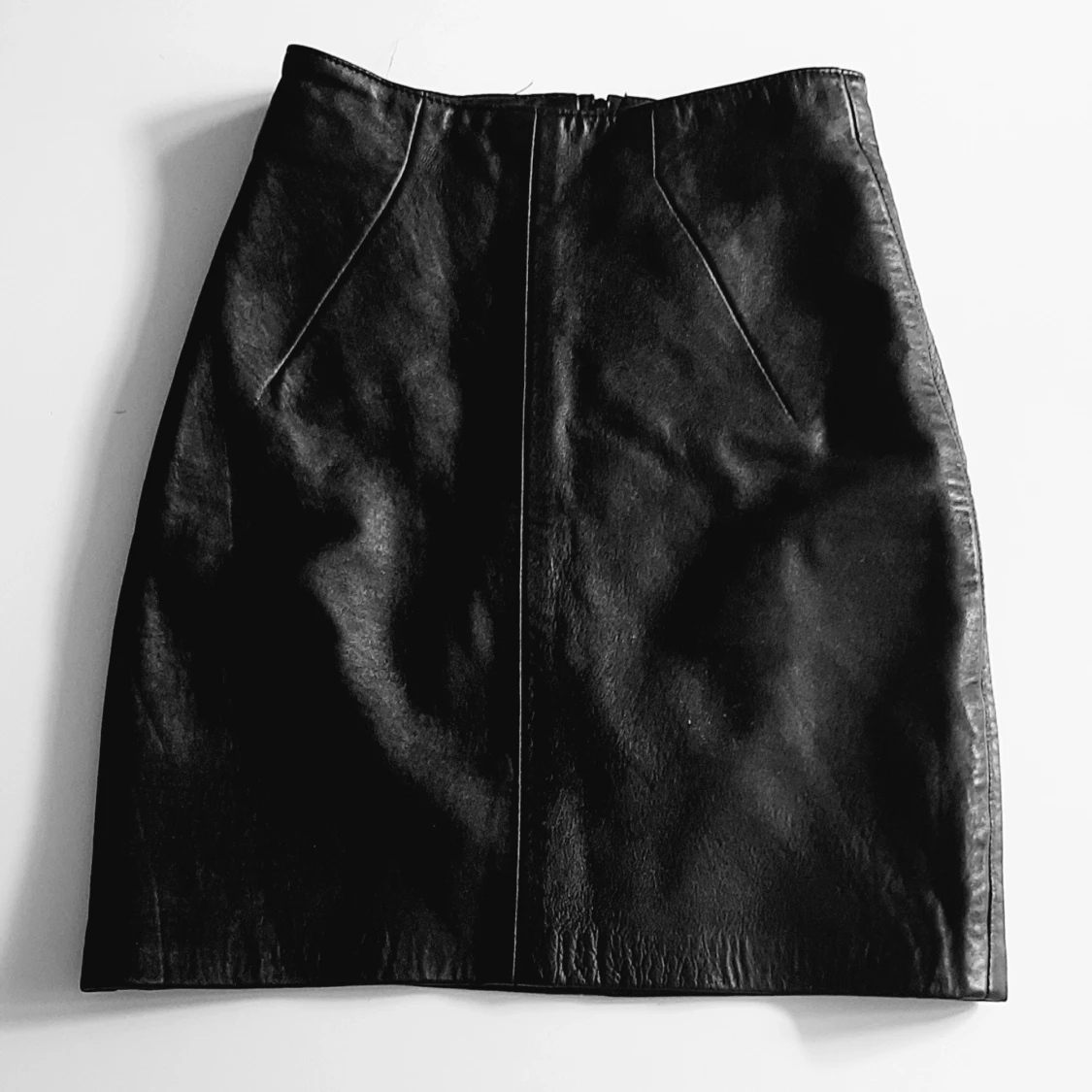 black leather skirt.