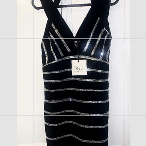 Partyklänning  - Helt ny partyklänning 