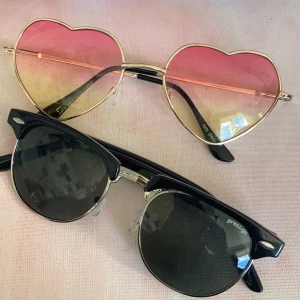 Solglasögon - 65 kr för båda, 30 kr för de svarta eller 45 för de hjärtformade!