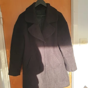 Free Quent Kappa - Svart Free Quent kappa i storlek L. I använt men gott skick. 