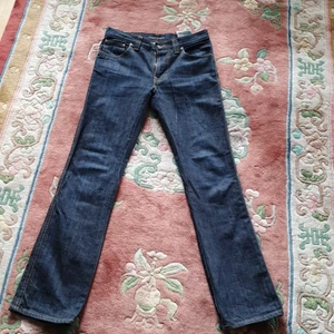 Nudie jeans  - Jätte fin åkta Nudie jeans som sitter jätte perfect på kroppen och matcherar med allt. Jeansen är användade cirka 2 gånger och passar xs_ s.Finns fler bilder 