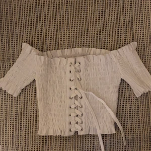 vit topp - jättefin vitt ”tubetopp”.  korsett vibes 