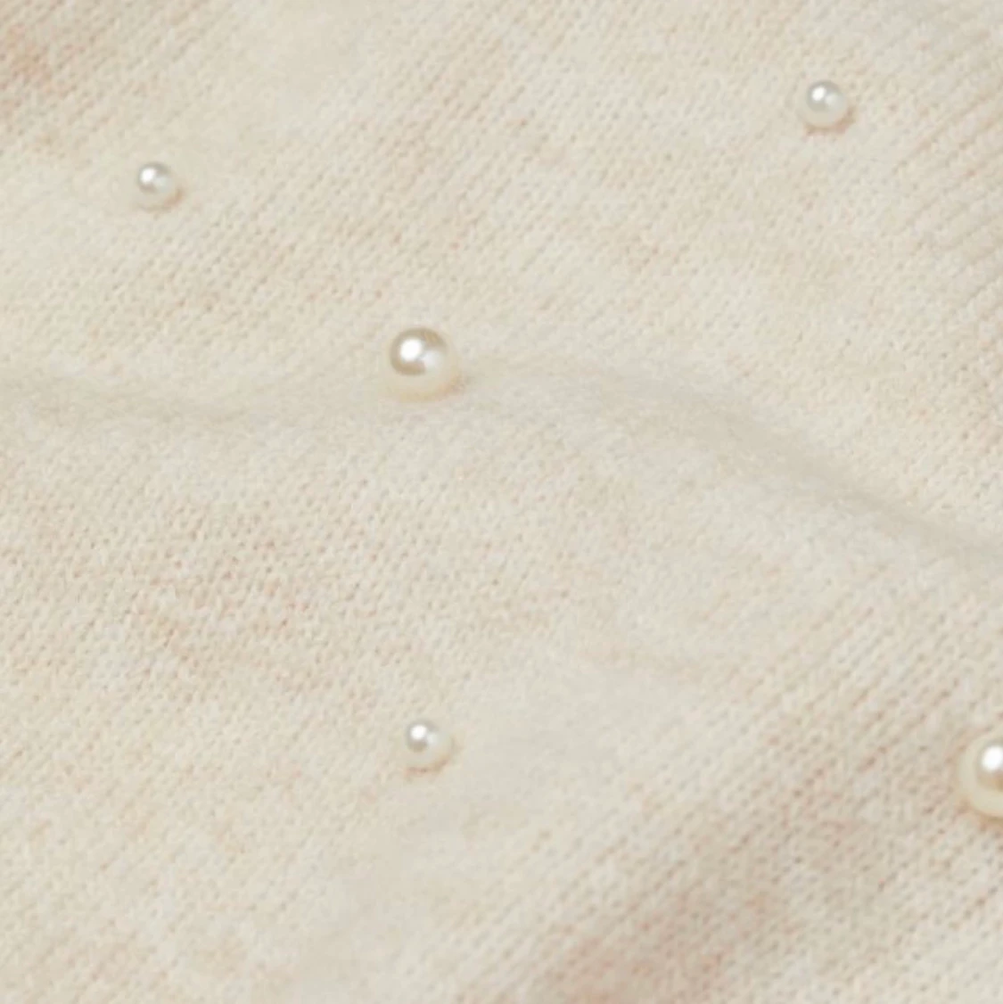 Stickad tröja med pärlor  - 90