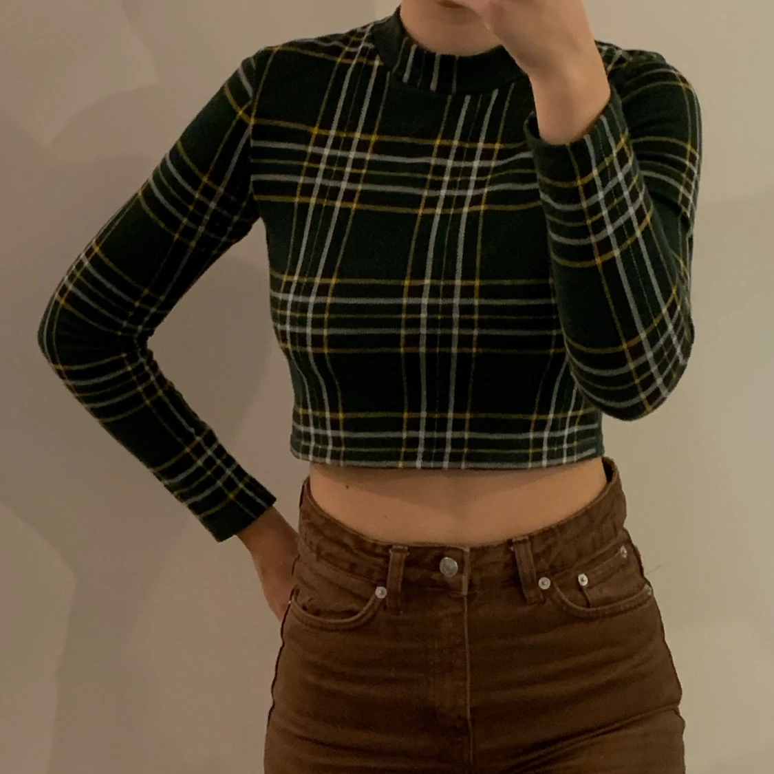 Mörkgrön mönstrad turtleneck