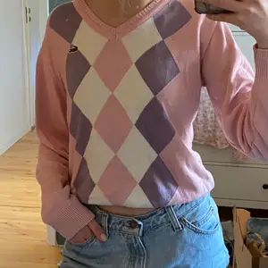 Rosa tröja från Lacoste 