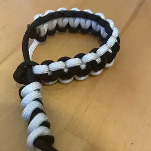 those are yin and yang bracelets which are made of USA paracord