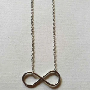 Evighets symbolen äkta silver halsband - Äkta 925 silver halsband evighet symbolen.längd 40 cm