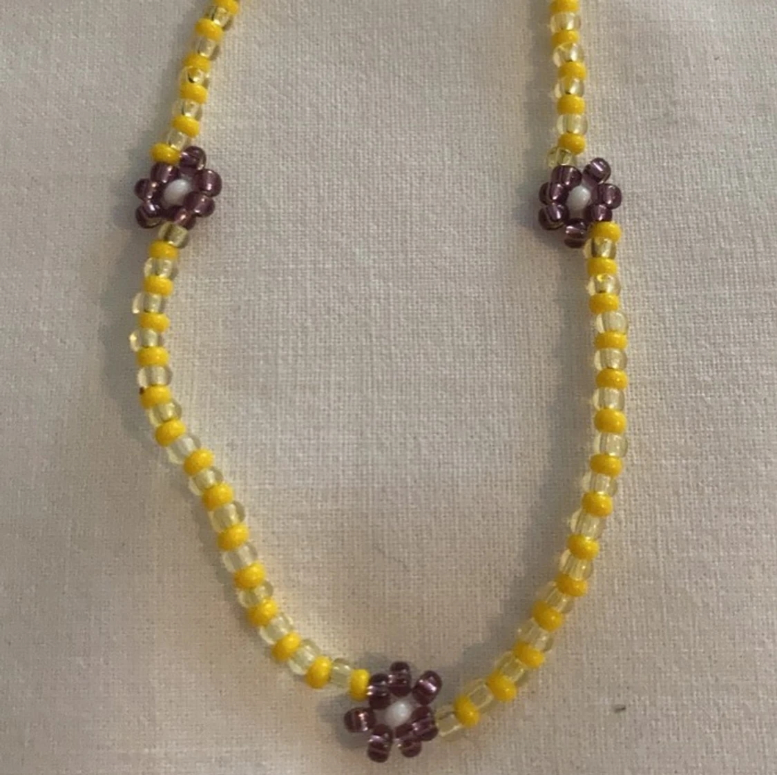Halsband blommor - 90