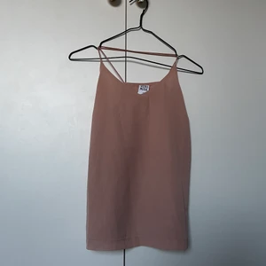 Vero Moda linne Str XS - Ett rosa linne från Vero Moda. Använd engång då den blev för liten. Passar även S.