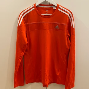 Funktionströja Adidas, Strl. M - Orange, långärmad funktionströja från Adidas, Strl. M. Fint skick