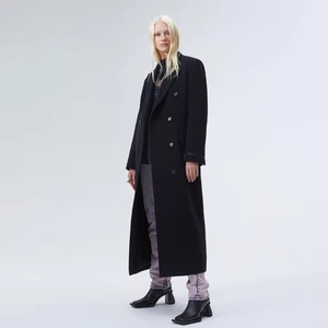 EYTYS Genesis Coat - EYTYS Genesis Black Coat Woman size S  Detta tar emot lite men efter många om och men har jag bestämt mig för att denna ska få ett nytt, bättre hem.   Den är sparsamt använd, max 10 gånger. Hittar inget att anmärka på. Slutsåld på hemsidan och butik.   Jag är vanligtvis en size M men även denna sitter bra på mig.   60% Wool 13% Polyamide 12% Polyester 7% Mohair 5% Cashmere. Nypris 5000kr