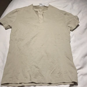 T-shirt  - Aldrig andvänd ! 