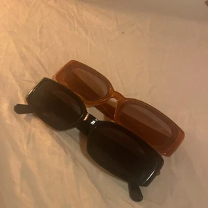 Solglasögon  - Solglasögon. Vet ej märke. 