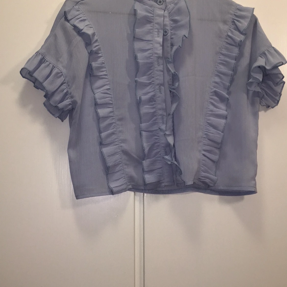 Ljusblå kortärmad blus 