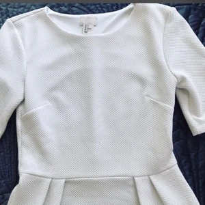 H&M Trend Peplum topp - En fin peplum topp som endast använts en gång. 