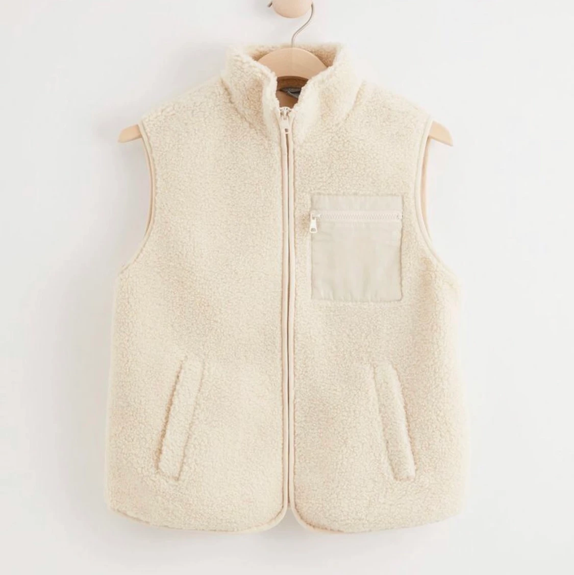 Vit pälsväst lindex