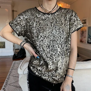 Glitter T-shirt  - Köpt i Barcelona på ett märke jag ej vet om. Men jätteskönt tyg på insidan och väldigt fin!