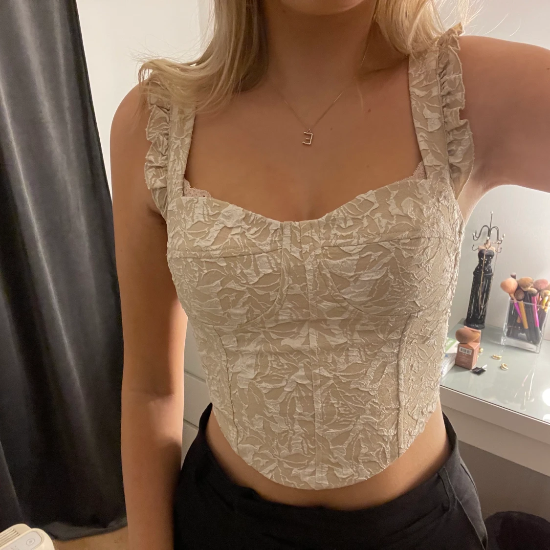 Korsettliknande topp