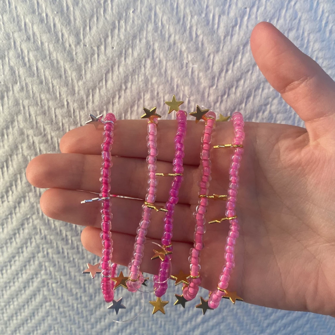 Rosa/guld armband 