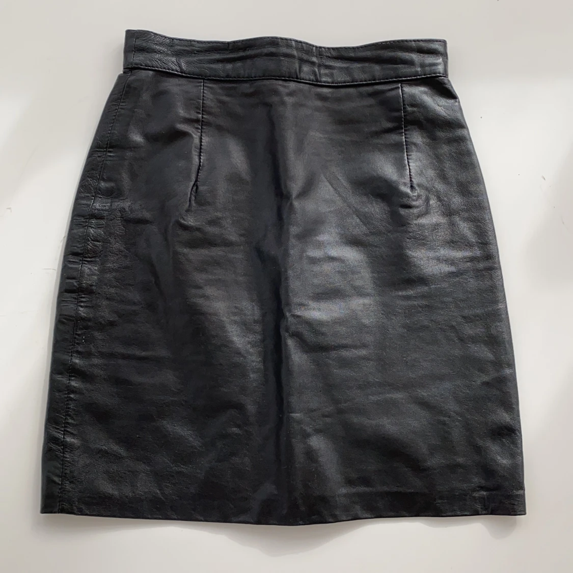 Svart skinnkjol - 90