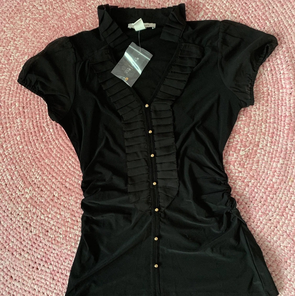 Blus från White House Black Market