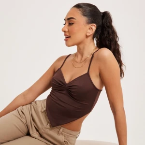 Nelly topp - Fin topp från Nelly! Använd 1 gång, kommer inte till användning, bra skick!