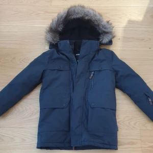 Vinterjacka  - Stl.134, gott skick, namnad, rejäl