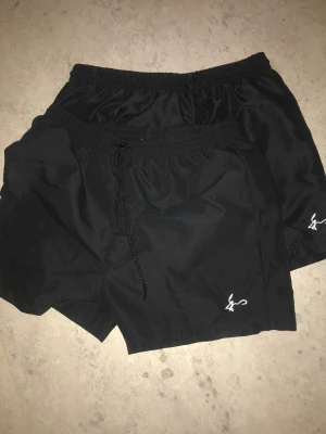 Ett shorts polyester  - Ett shorts polyester 