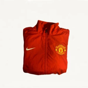 Manchester united windbreaker  - Windbreaker från nike, nyskick. 