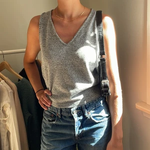 Topp - Glittrig topp i xs men passar även en s