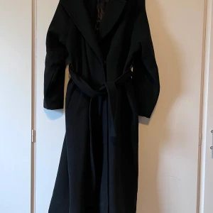 Ellos kappa strl 42/44 - I fint skick Knäppning och skärp i midjan 