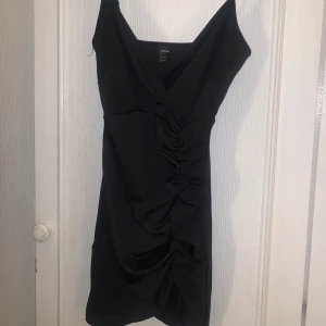 Svart klänning - Använd en gång